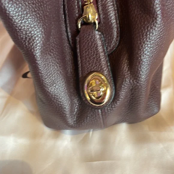 Coach Edie 31 Refined Pebble
Leather Shoulder Bag NWT in Oxblood w duster - Picture 6 of 9